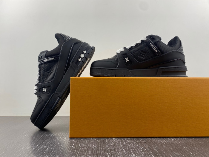 l**is V*t*n trainer all black embossing